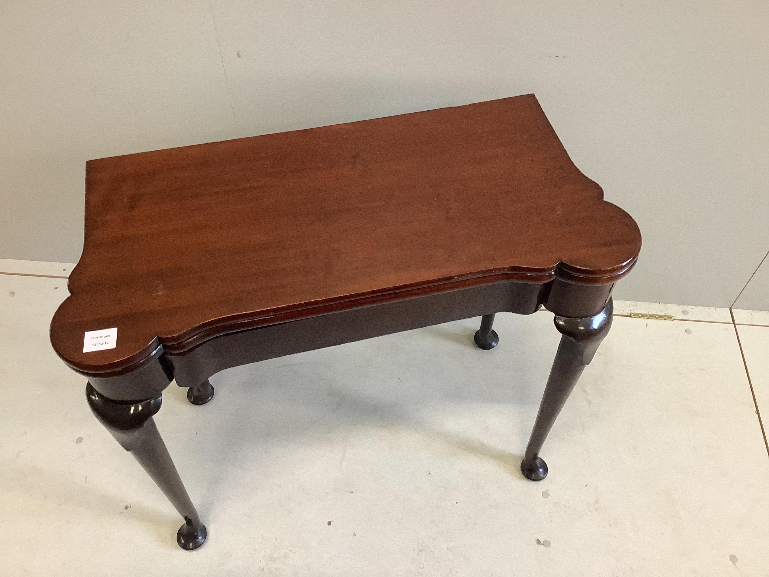 A George II mahogany folding card table, ex Arthur Bryant, width 83cm, depth 40cm, height 72cm